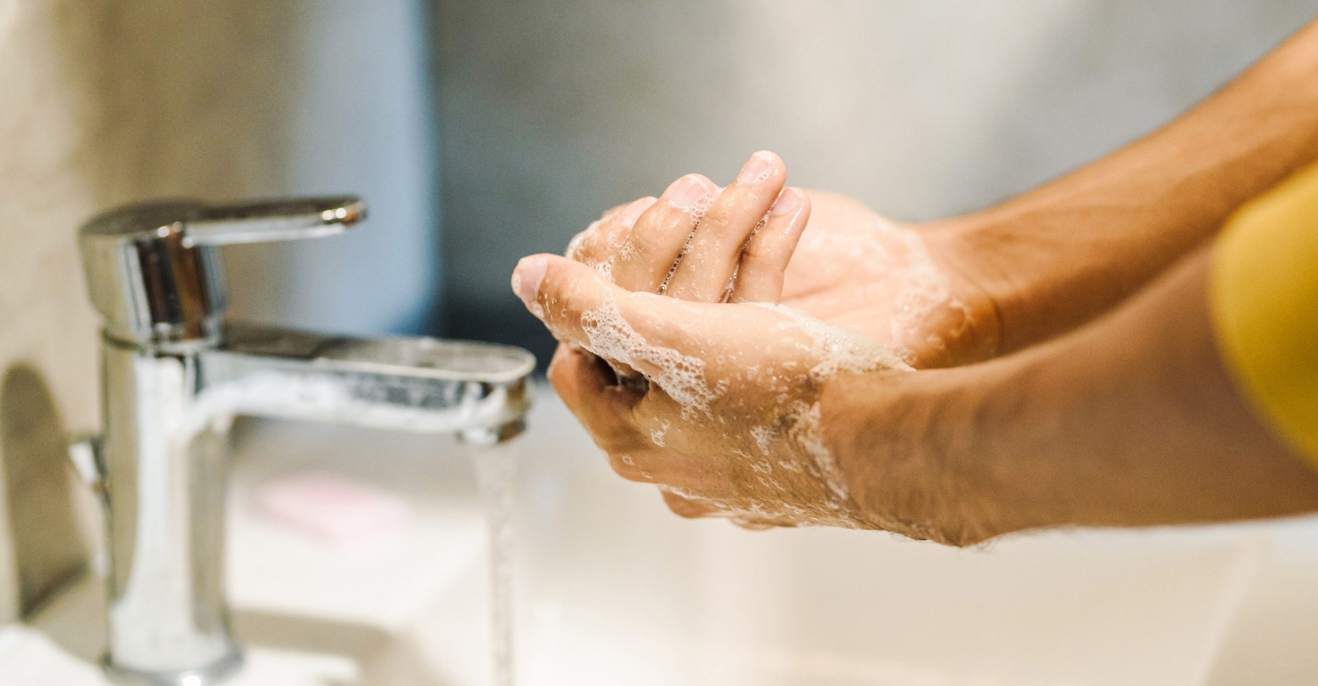 Person repeatedly washing hands, indicating signs of OCD, seeking OCD treatment in Chicago and Downers Grove