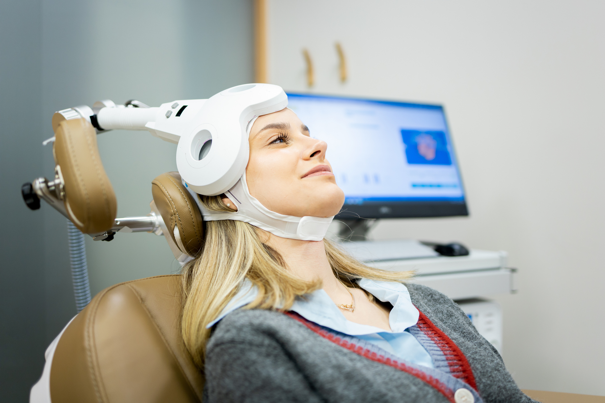 a Woman taking TMS Therapy in Chicago & Downers Grove